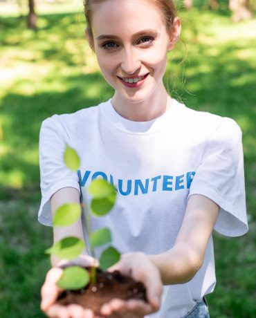 attractive-smiling-volunteer-holding-new-in-hands-2021-09-03-14-11-26-utc.jpg